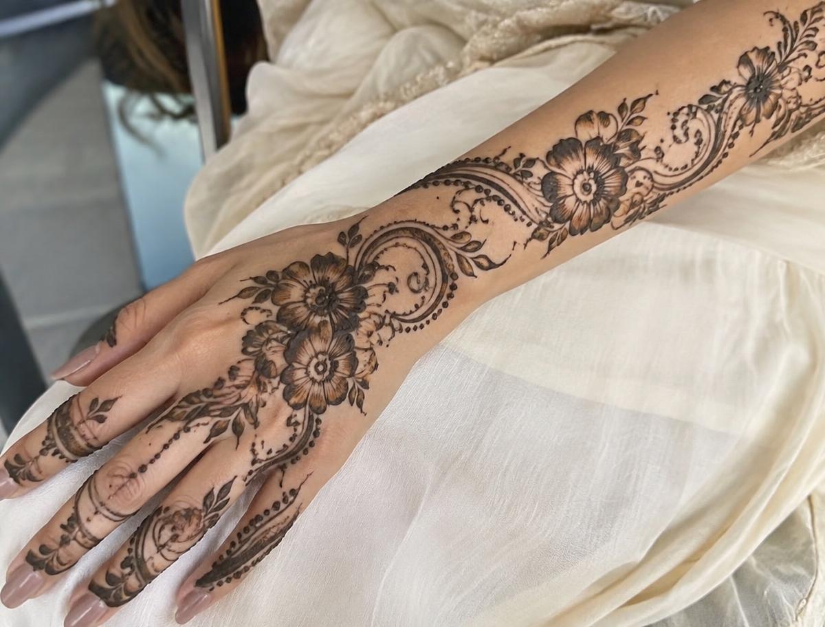 Arabic mehndi design on hand and forearm by Rubaiz Studio Hyderabad